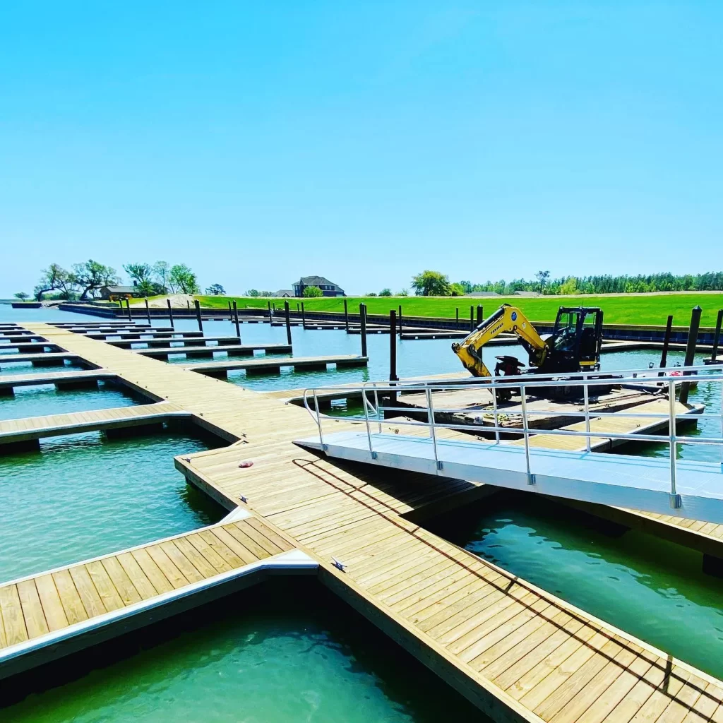 Logan Marine crew replacing dock pilings on a residential dock in Wilmington, NC